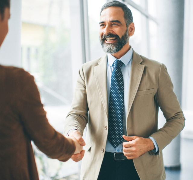 Colleagues shaking hands.