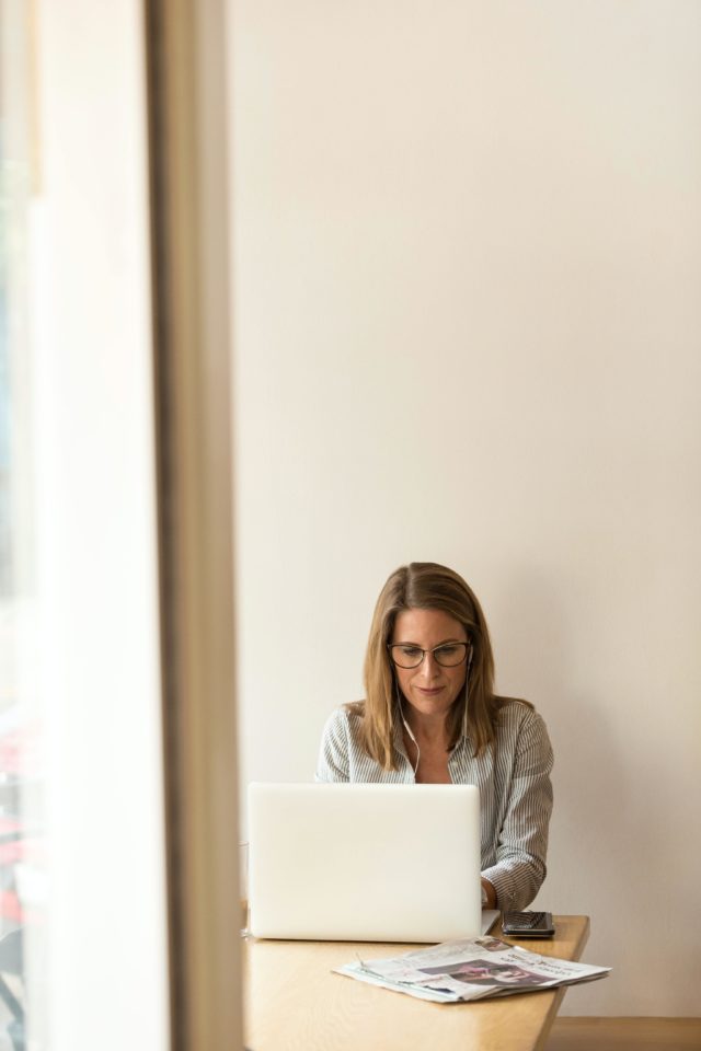 Female working at laptop.